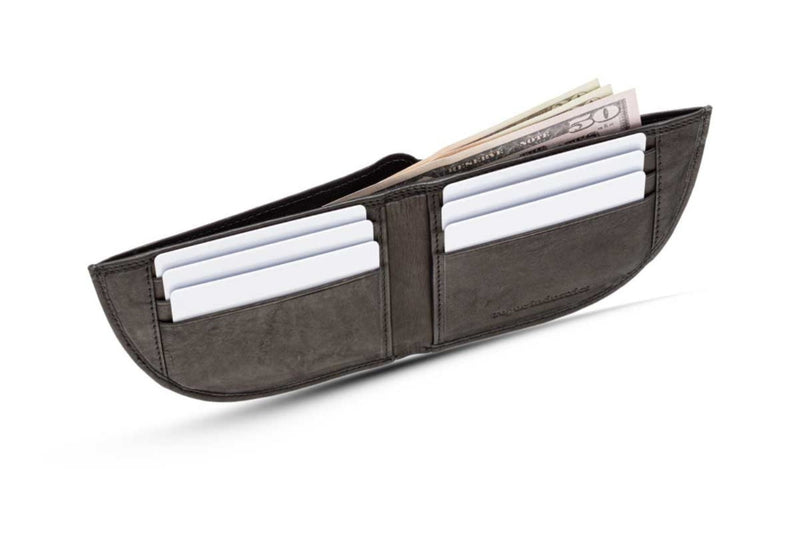 A black Nantucket Front Pocket Wallet by Tradevia with money in it.