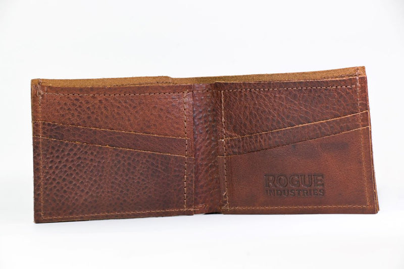A brown genuine cowhide leather Heritage Wallet by Tradevia with a logo on it, made in USA.