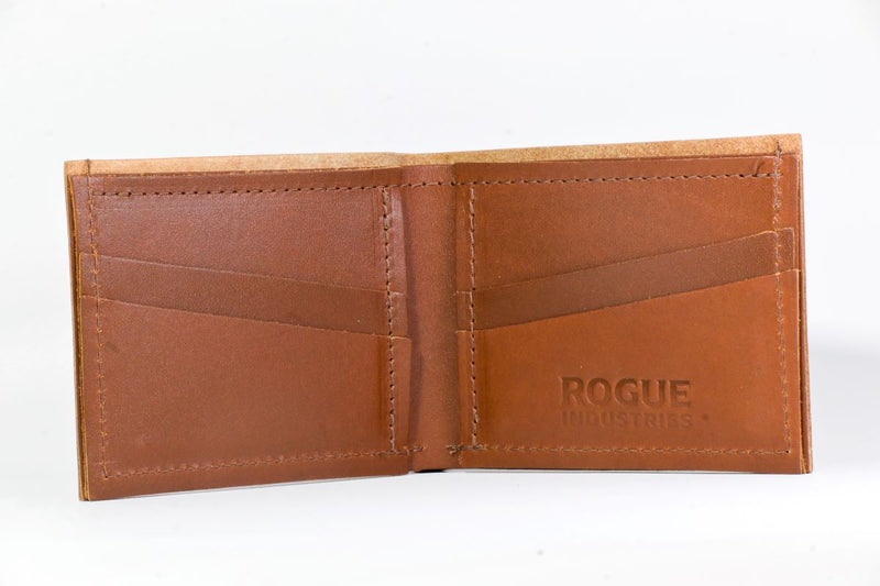 A genuine cowhide leather Heritage Wallet with a logo on it, made in the USA by Tradevia.