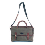A durable green waxed canvas laptop bag with brown leather straps by Tradevia.
