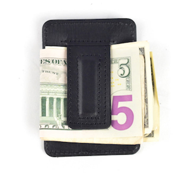 Introducing the Rogue Money Clip by Tradevia, a sleek wallet crafted from genuine top-grain leather, perfect for front pocket carry and capable of holding a five-dollar bill along with other currency.