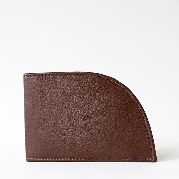 A brown Tradevia NON-RFID Made in Maine wallet on a white background.