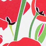 A close up of red poppies on a white background with Tradevia RFID Blocking credit card sleeves.