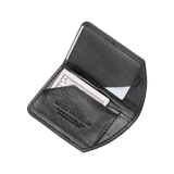 A slim, black leather Tradevia Minimalist Wallet with a credit card in it.