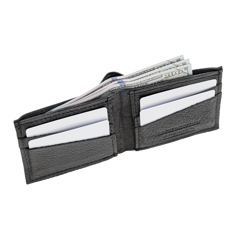 A black Tradevia Heritage Wallet in Bison Leather with two credit cards in it.