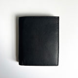A premium Tradevia leather badge holder wallet on a white surface.