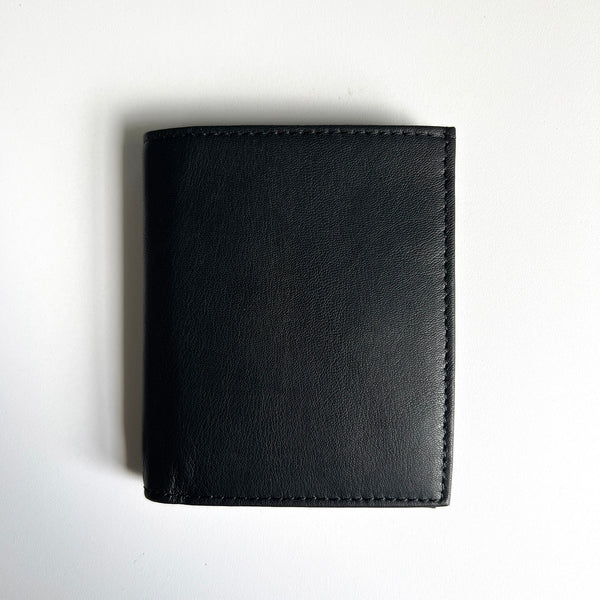 A premium Tradevia leather badge holder wallet on a white surface.