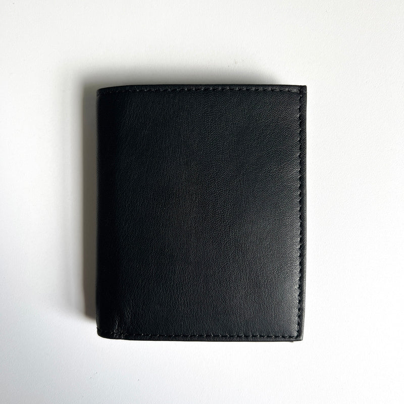 A premium Tradevia leather badge holder wallet on a white surface.