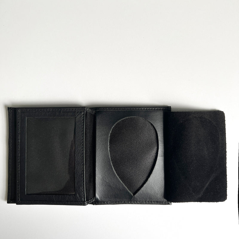 A premium Leather Badge Holder Wallet with a black leather cover from Tradevia.