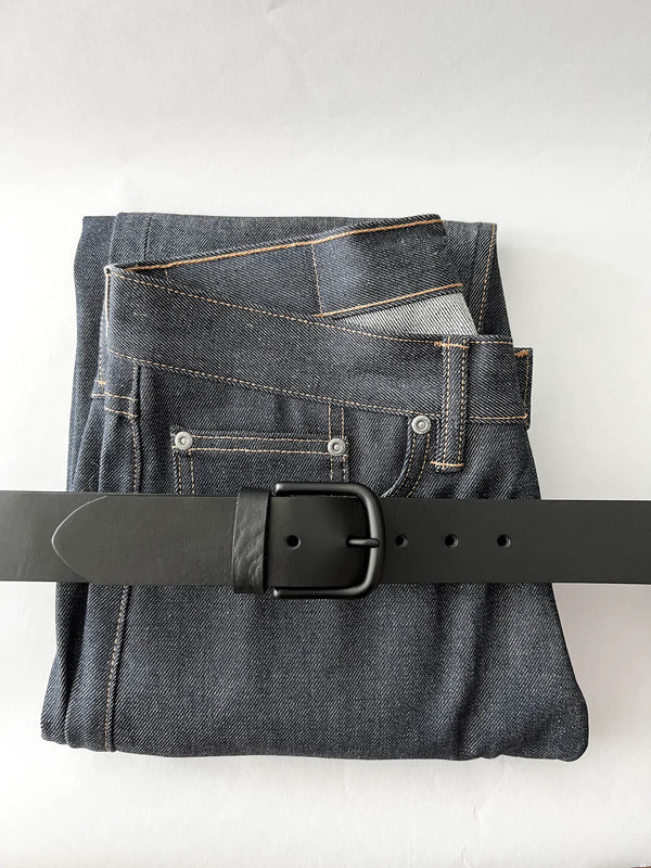 A pair of jeans with a Baxter Belt and Made in Maine Rogue Wallet Bundle from Tradevia.