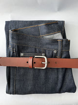 A minimalist pair of jeans with a Tradevia Chamberlain Belt and Minimalist Wallet Bundle.