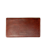 A brown American Bison leather checkbook cover with the word "focus" on it, crafted in a Maine workshop by Tradevia.