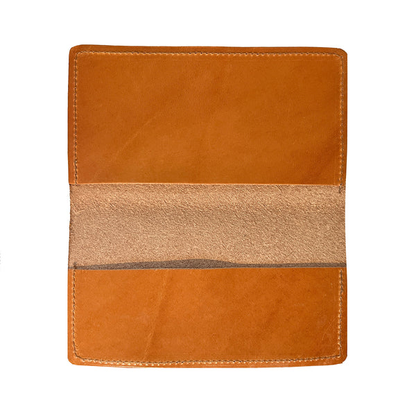 An orange Tradevia American Bison leather checkbook cover on a white background.