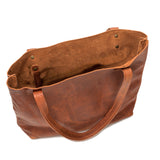 A brown full-grain leather Fore Street tote bag by Tradevia with a handle.
