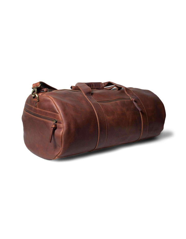 A Seal Cove Leather Duffle Bag by Tradevia on a white background.