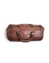 An imported Seal Cove Leather Duffle Bag by Tradevia on a white background.