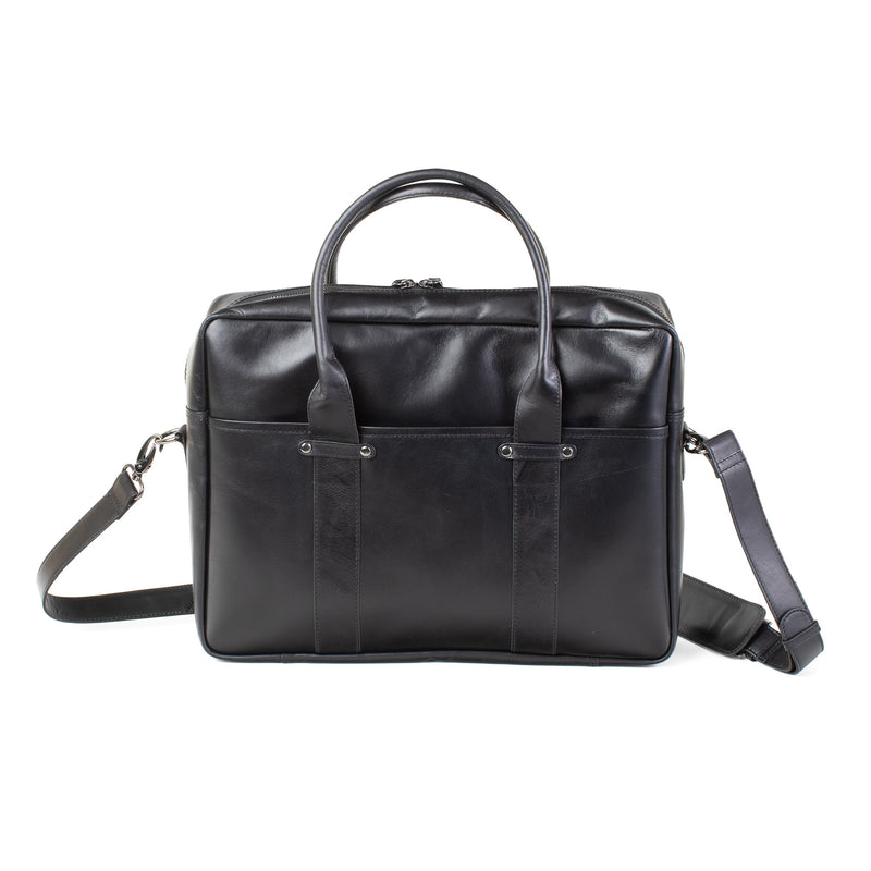 The black Tradevia Katahdin Leather Briefcase with a removable strap is on a white background.