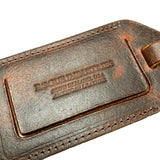 An image of a brown Rogue Leather Luggage Tag from Tradevia.