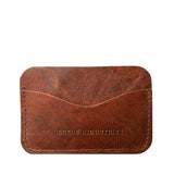 A brown Tradevia moose leather card case with the words made industries on it.