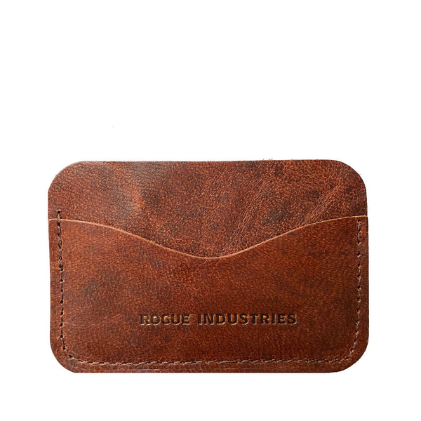 A brown Tradevia moose leather card case with the words made industries on it.