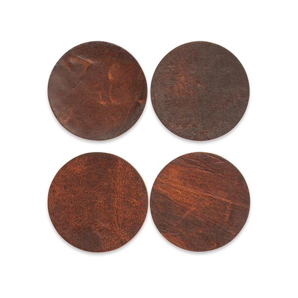 Four brown Tradevia Moose Leather Coasters on a white background.