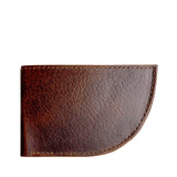 A Factory Second PREVIOUSLY EMBOSSED Made in Maine Front Pocket Wallet from Tradevia, featuring brown leather with stitching detail along the edges, a rounded bottom right corner, and RFID-blocking technology.