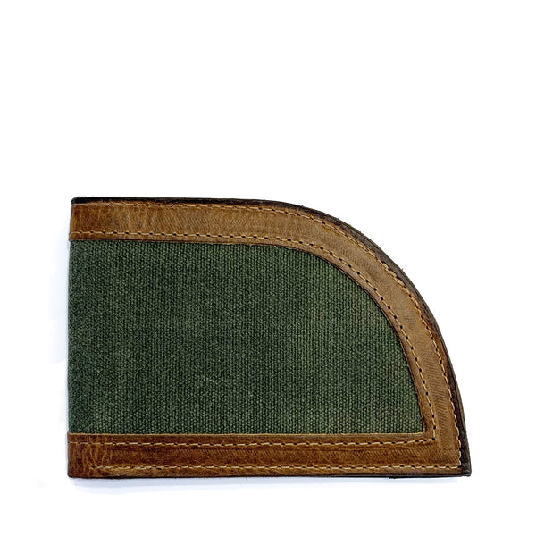 A green Tradevia Bison leather wallet with brown and tan trim.