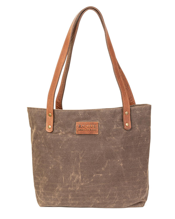A durable Allagash River tote bag with brown leather handles by Tradevia.