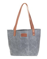 The durable Allagash River tote bag with brown leather handles by Tradevia.