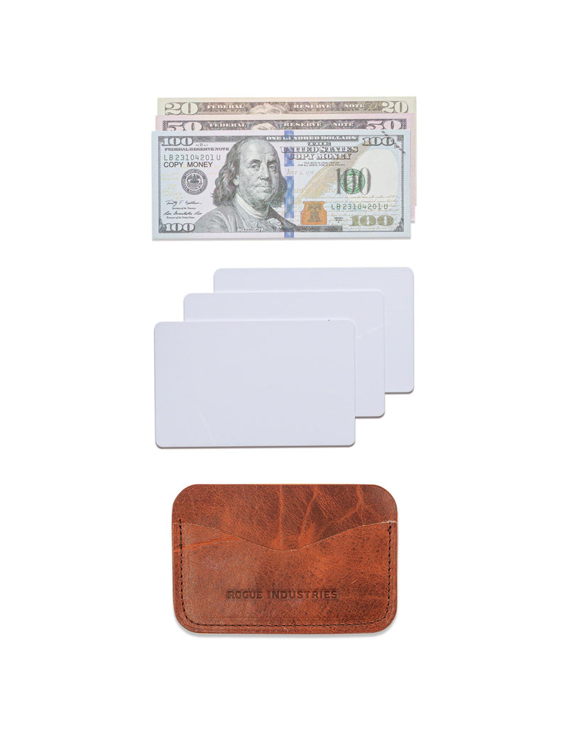 A Maine crafted Tradevia brown American Bison leather Bison Card Case with a dollar bill and a credit card.