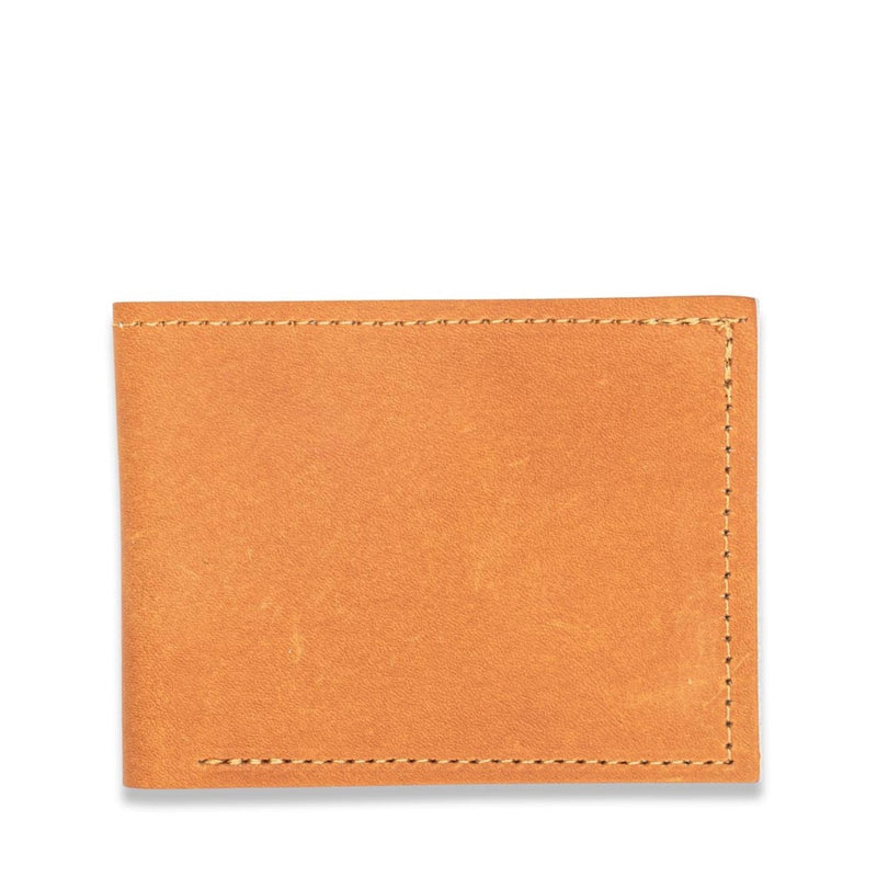 A Heritage Wallet in Baseball Glove Leather by Tradevia on a white background.