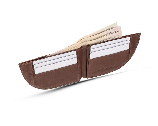 A brown Tradevia Nantucket Front Pocket Wallet in Moose Leather with money in it.