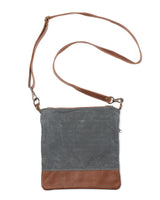 A grey and brown Tradevia Ellis River Crossbody Bag.