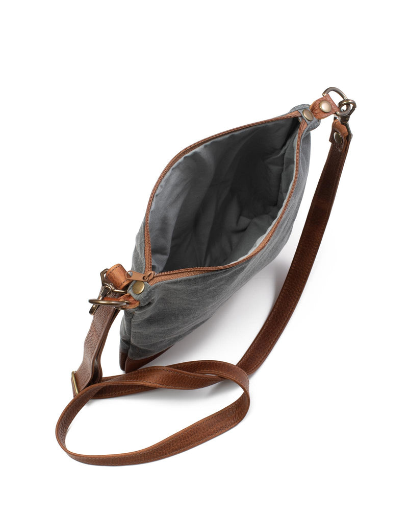 The grey and tan Ellis River Crossbody Bag by Tradevia is on a white background.
