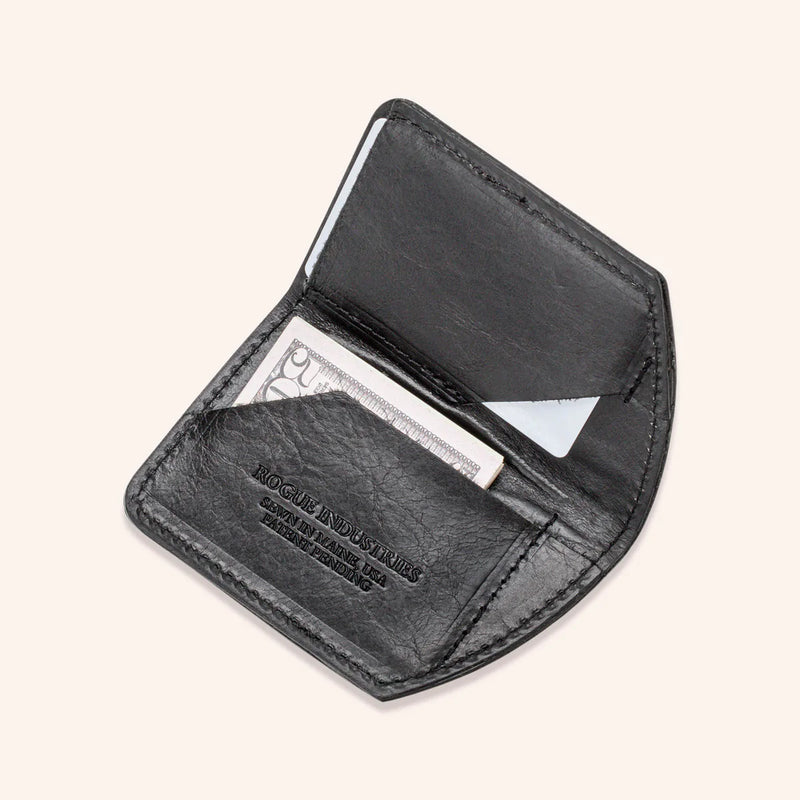 A Tradevia Chamberlain Belt and Minimalist Wallet Bundle with a credit card inside.