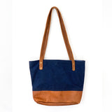 A blue and tan Tradevia Saco River Tote Bag on a white background.