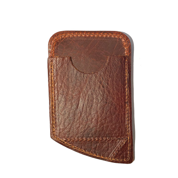 A Tradevia Slim Leather Card Carrier case with stitching, designed for comfortable carry in the front pocket.