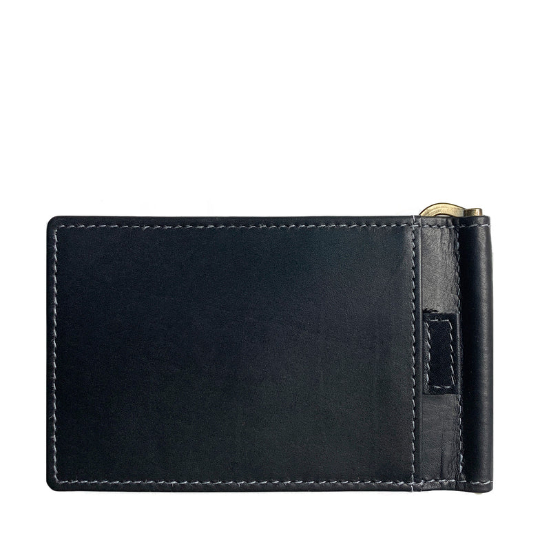A black Tradevia Minimalist Wallet with Money Clip and a gold clasp.