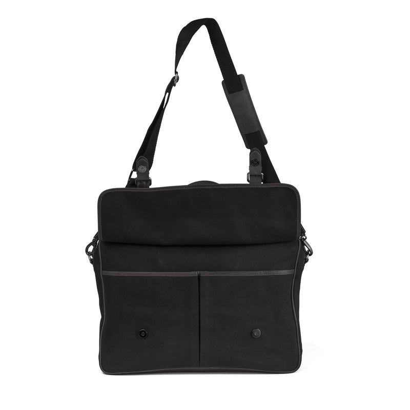 A durable waxed canvas laptop bag by Tradevia on a white background.