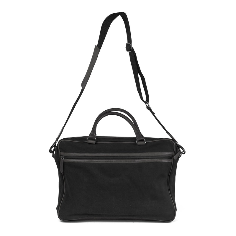 A durable Tradevia Waxed Canvas Laptop Bag on a white background.