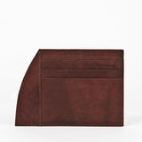 A brown, top-grain leather Tradevia Weekend Card Holder - 6 Series on a white background.