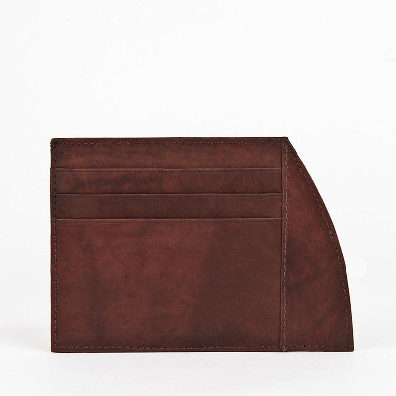 A Weekend Card Holder - 6 Series in brown top-grain leather by Tradevia on a white background.